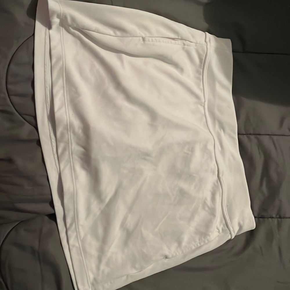 White, tennis/golf skirt with shorts, wore it once, in good condition